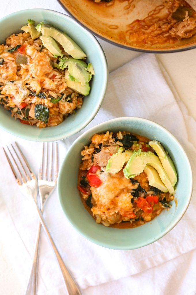 This One-Pot Chicken Enchilada Rice is gluten free and super easy to make on a weeknight. It also has hidden veggies for kiddos!