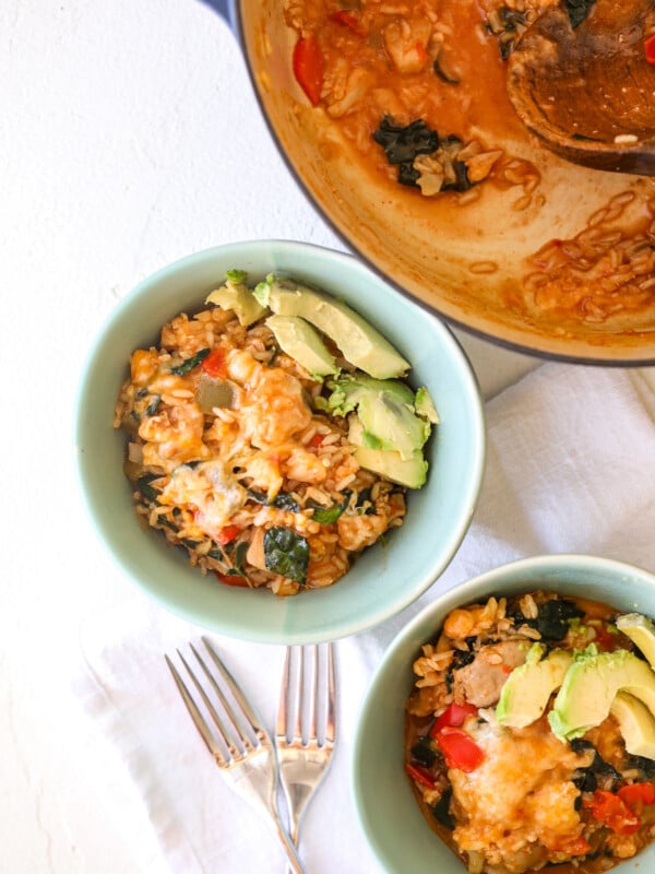 This One-Pot Chicken Enchilada Rice is gluten free and super easy to make on a weeknight. It also has hidden veggies for kiddos!