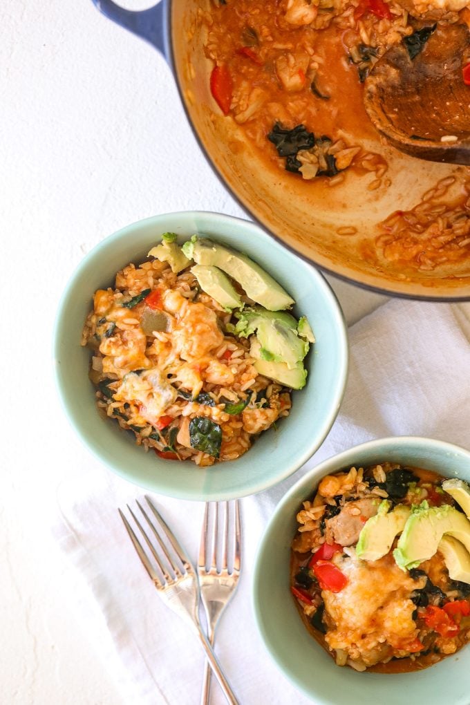 This One-Pot Chicken Enchilada Rice is gluten free and super easy to make on a weeknight. It also has hidden veggies for kiddos!