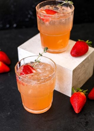 This Strawberry Thyme Spritz is a super easy and healthy cocktail you will love!