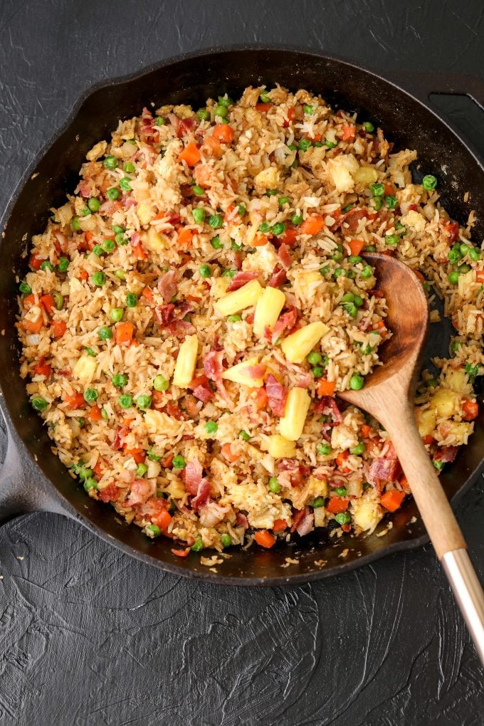 This Bacon Pineapple Veggie Fried Rice is half rice and half cauliflower rice making it packed with veggies and flavor!