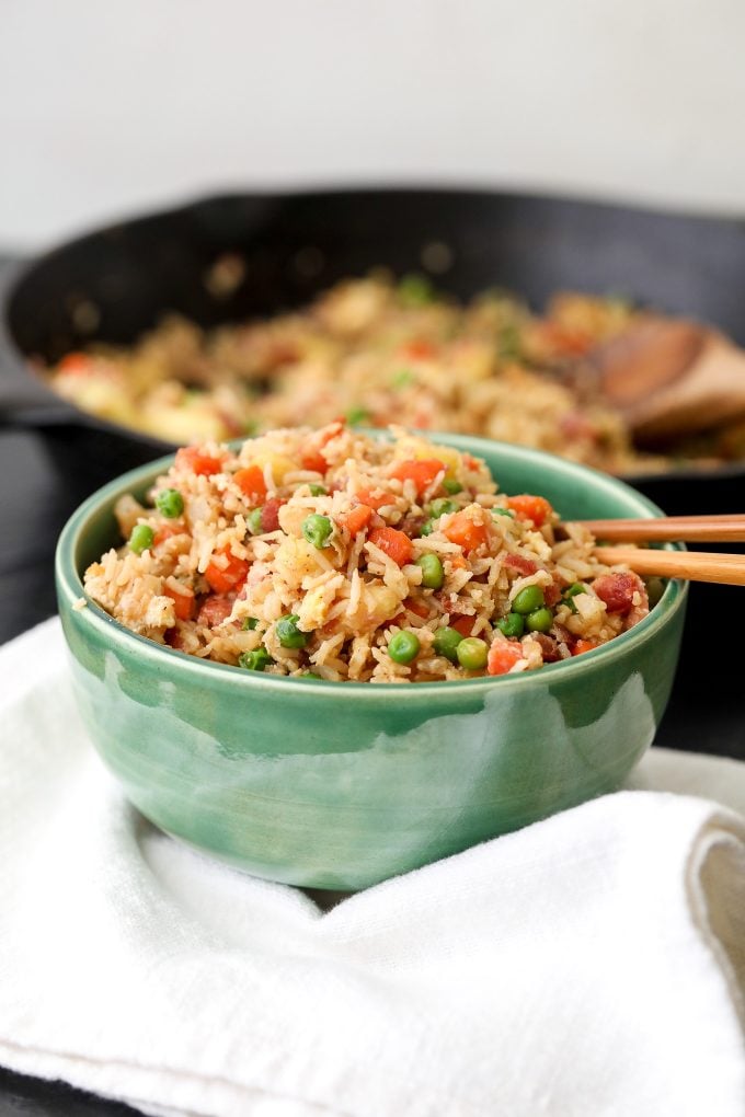 This Bacon Pineapple Veggie Fried Rice is half rice and half cauliflower rice making it packed with veggies and flavor!