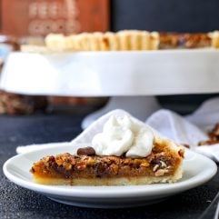 This Chocolate Chunk Bourbon Pecan Tart is a simple and delicious recipe that is gluten free and refined sugar free - no corn syrup!