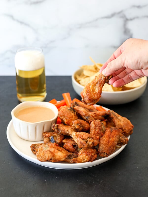 This Baked Thai Chicken Wings with peanut dipping sauce recipe is so delicious and perfect for any weeknight or big game!