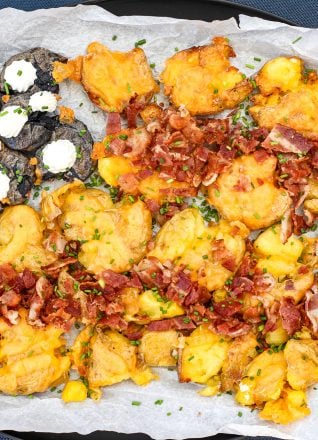 These Smashed & Loaded Potatoes are perfect for summer! Turn them into an american flag to impress on the 4th of July!