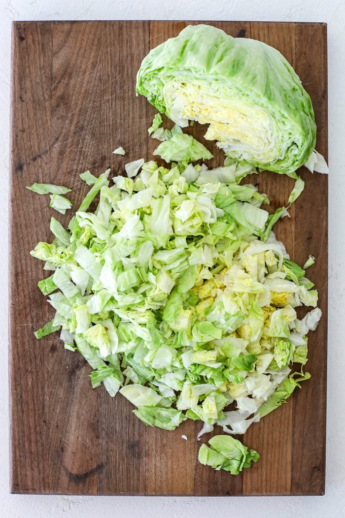 This Chopped Wedge Salad is a simple recipe that can easily be a main dish or side salad to any meal! With just 5 ingredients it comes together in a pinch.