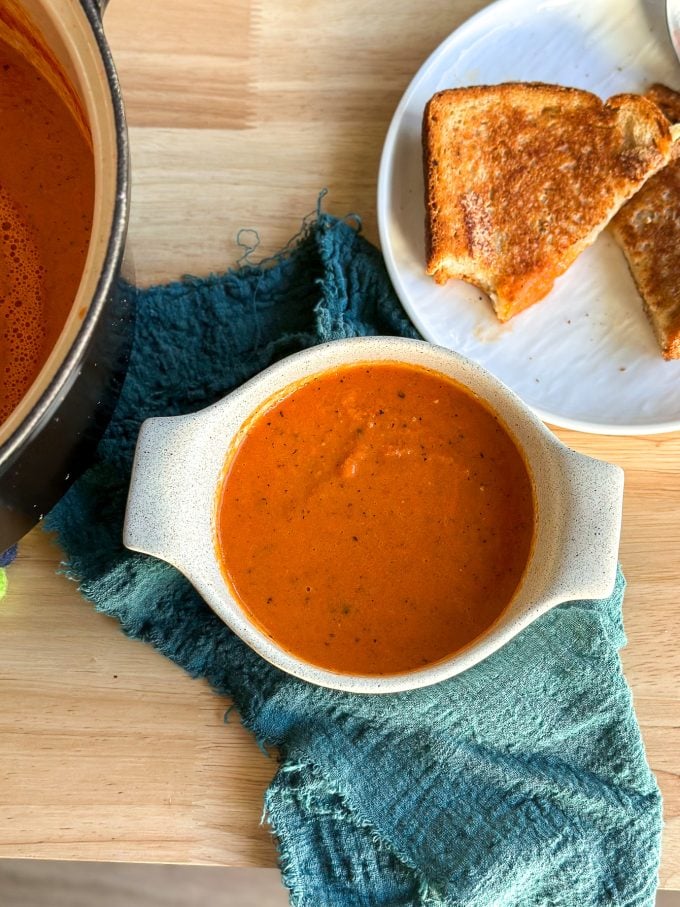 This Roasted Bell Pepper & Tomato Soup recipe is perfect for the colder months & a grilled cheese!