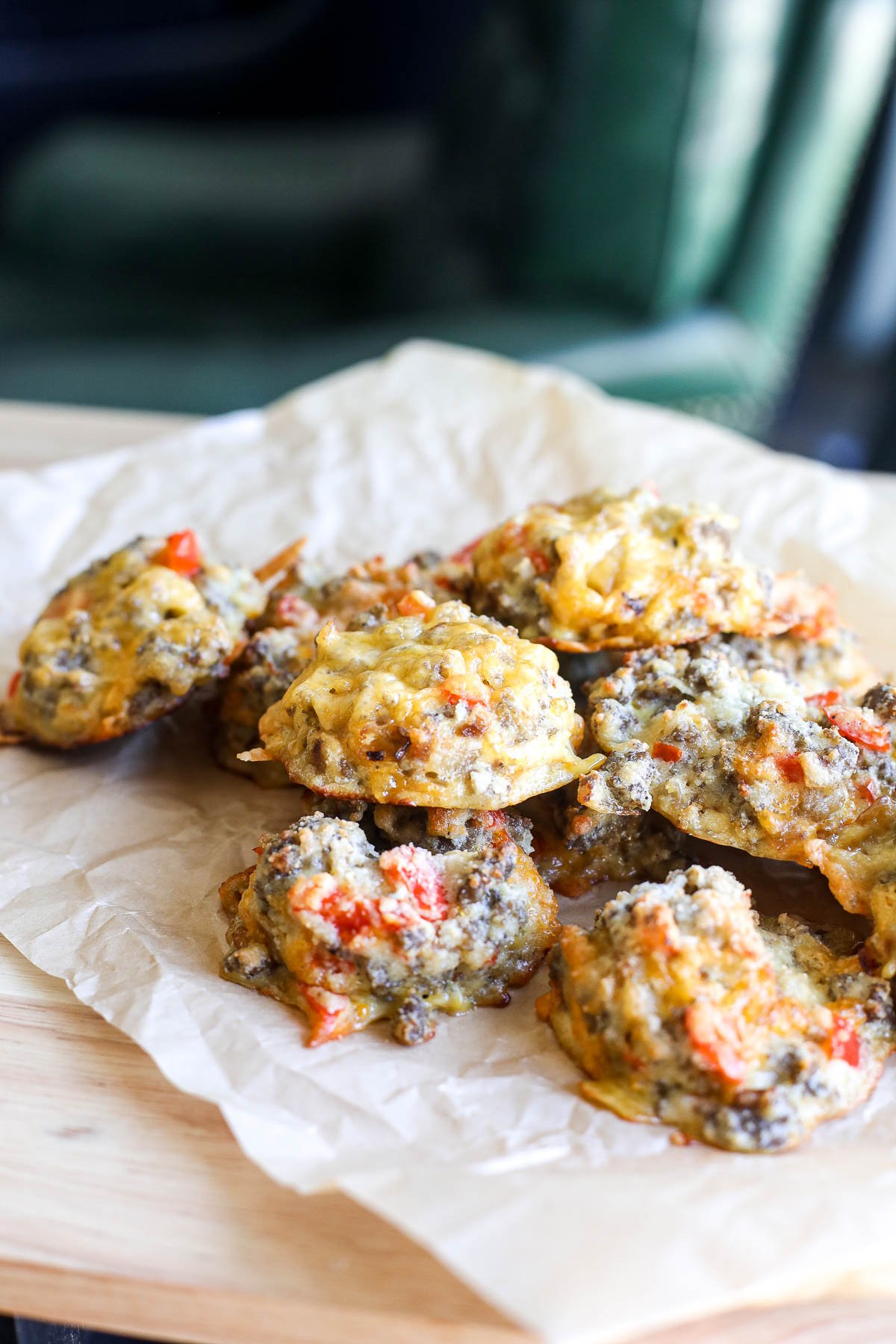 Enjoy protein-packed, gluten-free Caramelized Onion & Sausage Egg Biscuits for a savory breakfast treat!