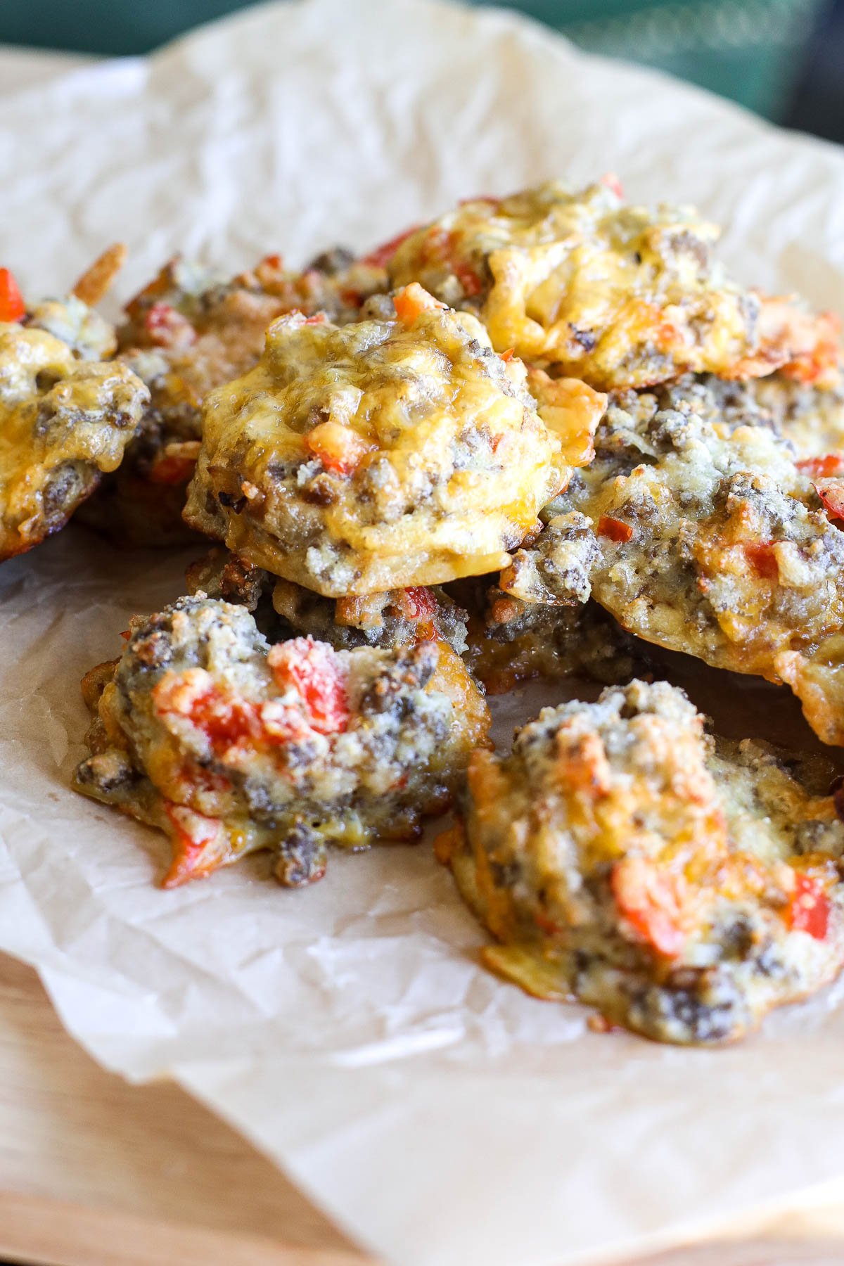 Enjoy protein-packed, gluten-free Caramelized Onion & Sausage Egg Biscuits for a savory breakfast treat!