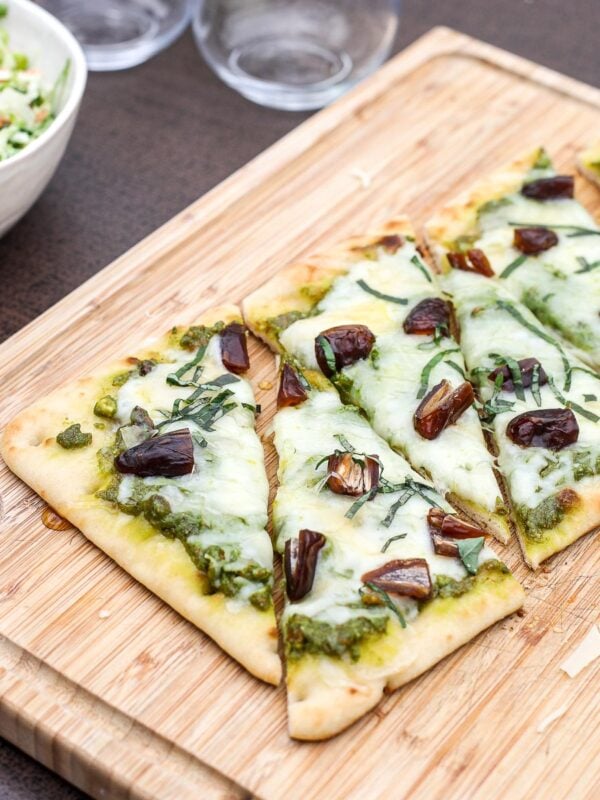 Savor our Pistachio Pesto & Date Flatbread! A delicious, nutty twist on a classic, perfect for a flavorful and easy meal.