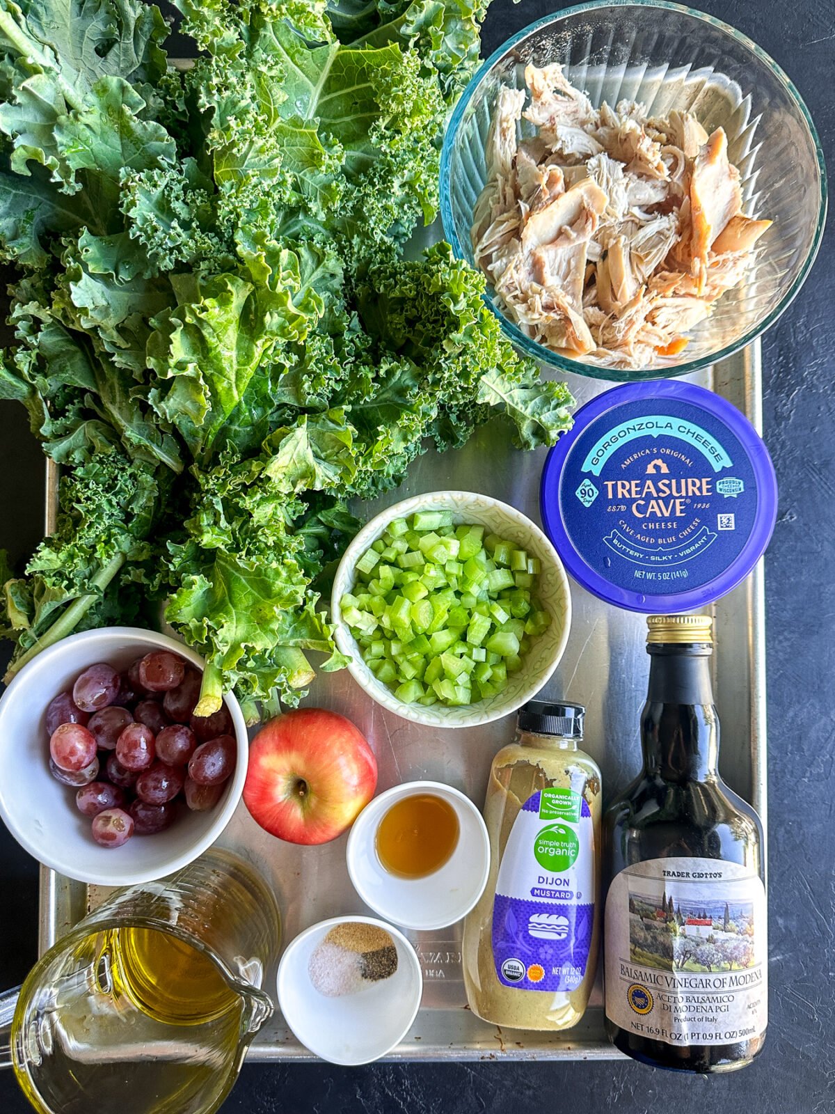 Crisp chopped kale Waldorf salad with apples, walnuts, and a tangy dressing. A healthy twist on the classic recipe!