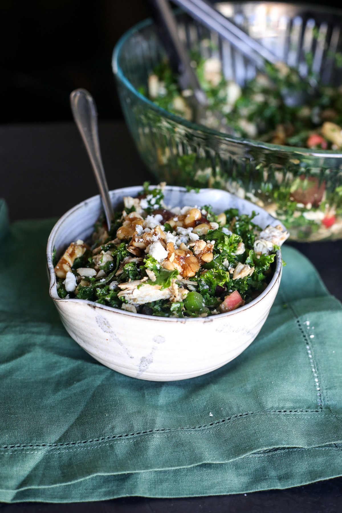 Crisp chopped kale Waldorf salad with apples, walnuts, and a tangy dressing. A healthy twist on the classic recipe!