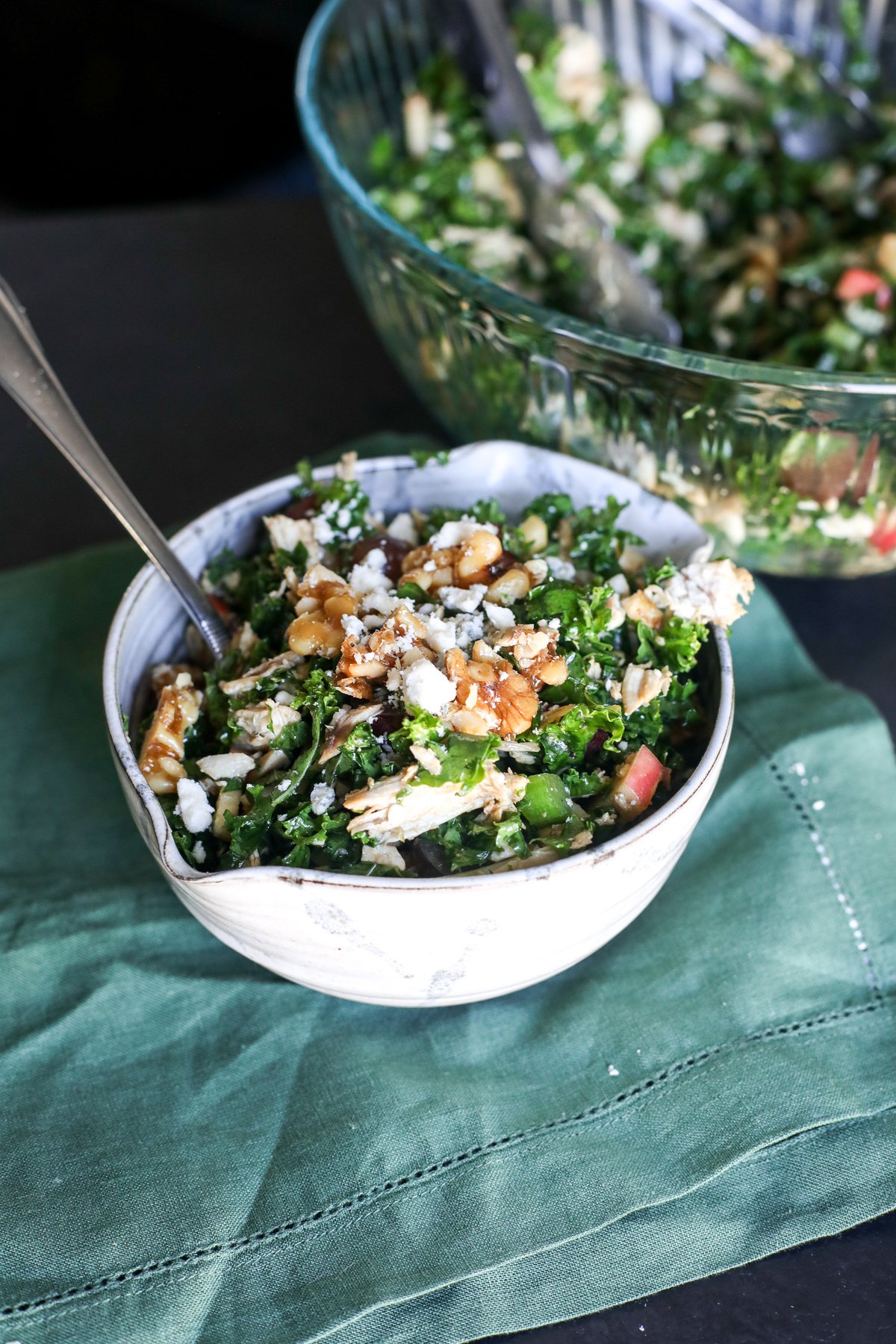 Crisp chopped kale Waldorf salad with apples, walnuts, and a tangy dressing. A healthy twist on the classic recipe!