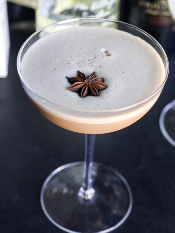 Sip on a Dirty Chai Martini—a bold blend of coffee liqueur, chai spices, and vodka for the perfect spicy-sweet cocktail treat!