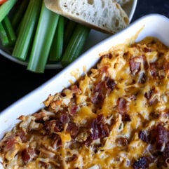 This High Protein Buffalo Chicken Bacon Ranch Dip is the perfect game day snack! Packed with flavor and protein, it's low-carb and keto-friendly.