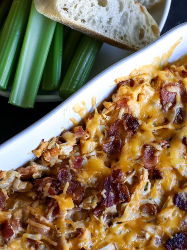 This High Protein Buffalo Chicken Bacon Ranch Dip is the perfect game day snack! Packed with flavor and protein, it's low-carb and keto-friendly.