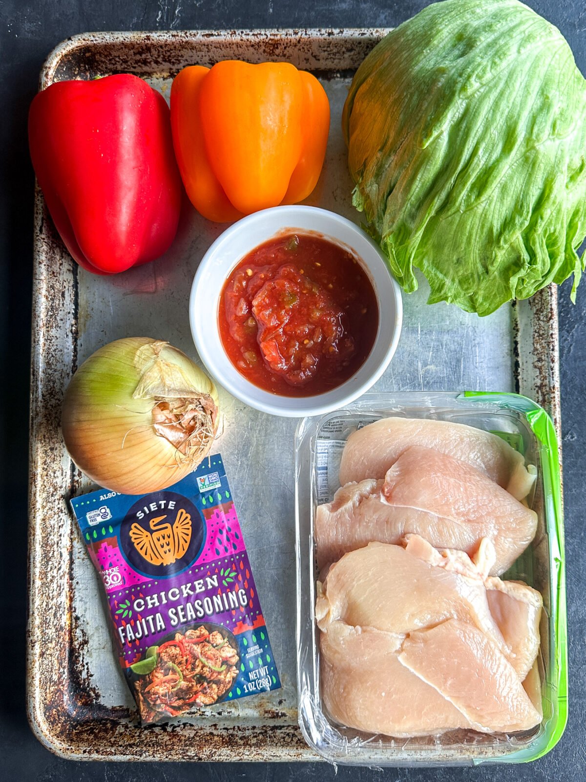 Easy & healthy chopped fajita lettuce cups recipe! Flavorful chicken & veggies in crisp lettuce. Perfect for a quick, low-carb meal.