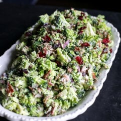 Crunchy & healthy broccoli salad with bacon, cranberries, and a creamy Greek yogurt dressing. Perfect for picnics or a quick side!