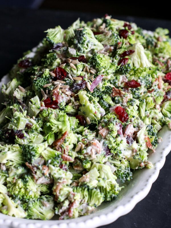 Crunchy & healthy broccoli salad with bacon, cranberries, and a creamy Greek yogurt dressing. Perfect for picnics or a quick side!