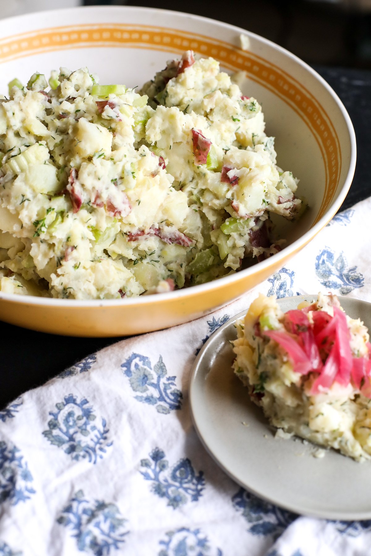 Creamy & flavorful Perfect Ranch Potato Salad recipe! Easy to make with red potatoes, celery, dill, and tangy red wine vinegar. A crowd-pleasing side!