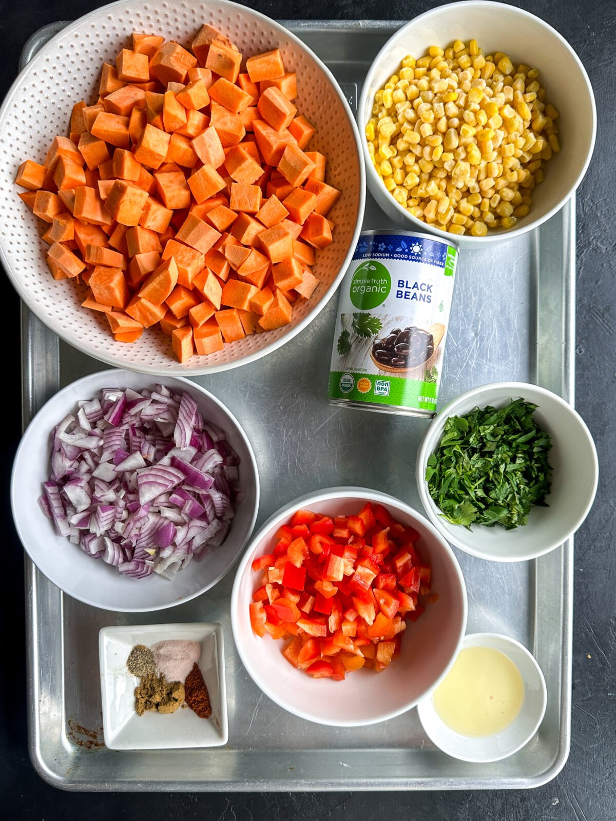 Flavorful Sweet Potato, Black Bean & Corn Salad with a creamy cilantro dressing. Easy, healthy & perfect for a side or light meal!