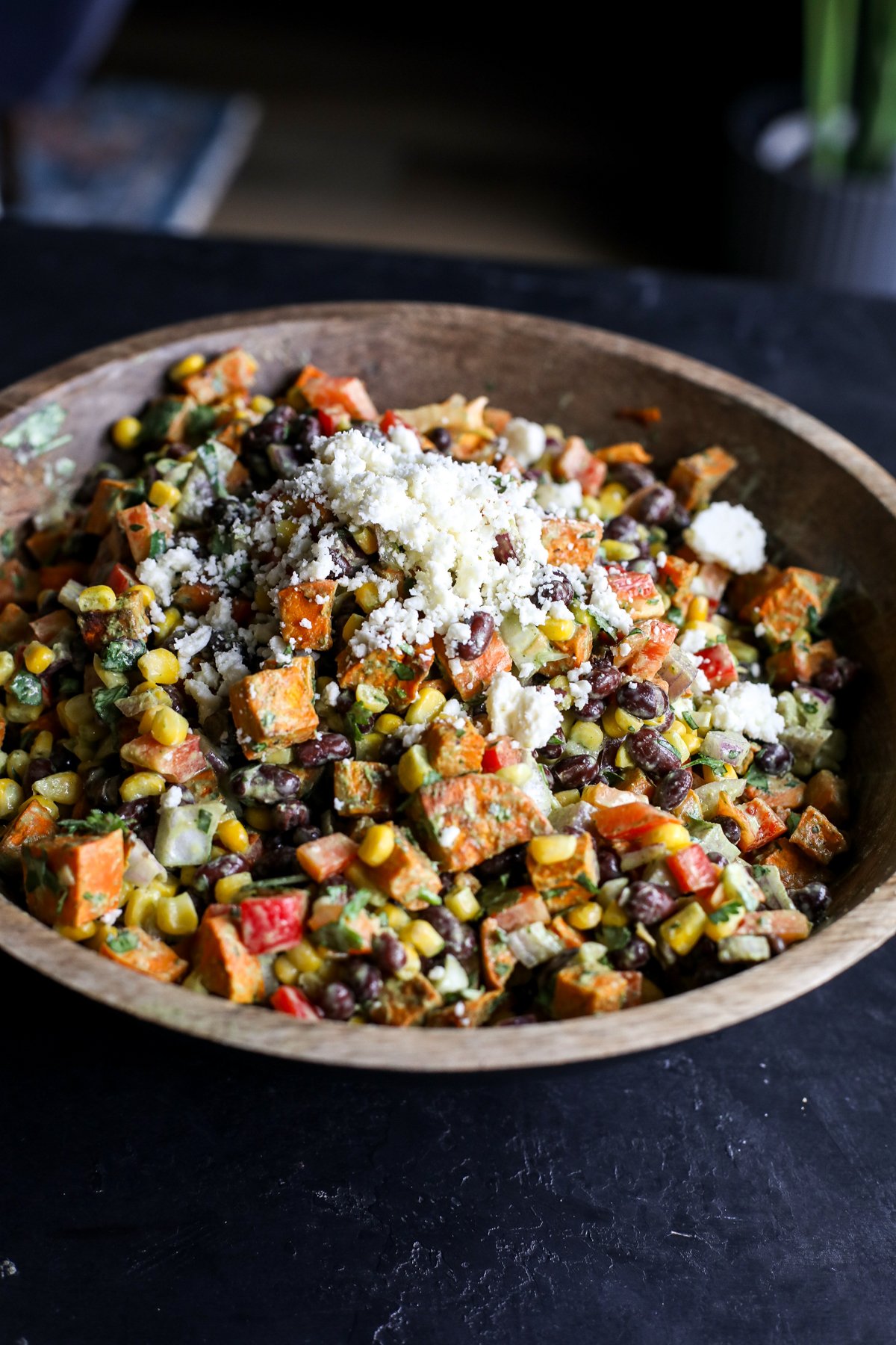 Flavorful Sweet Potato, Black Bean & Corn Salad with a creamy cilantro dressing. Easy, healthy & perfect for a side or light meal!