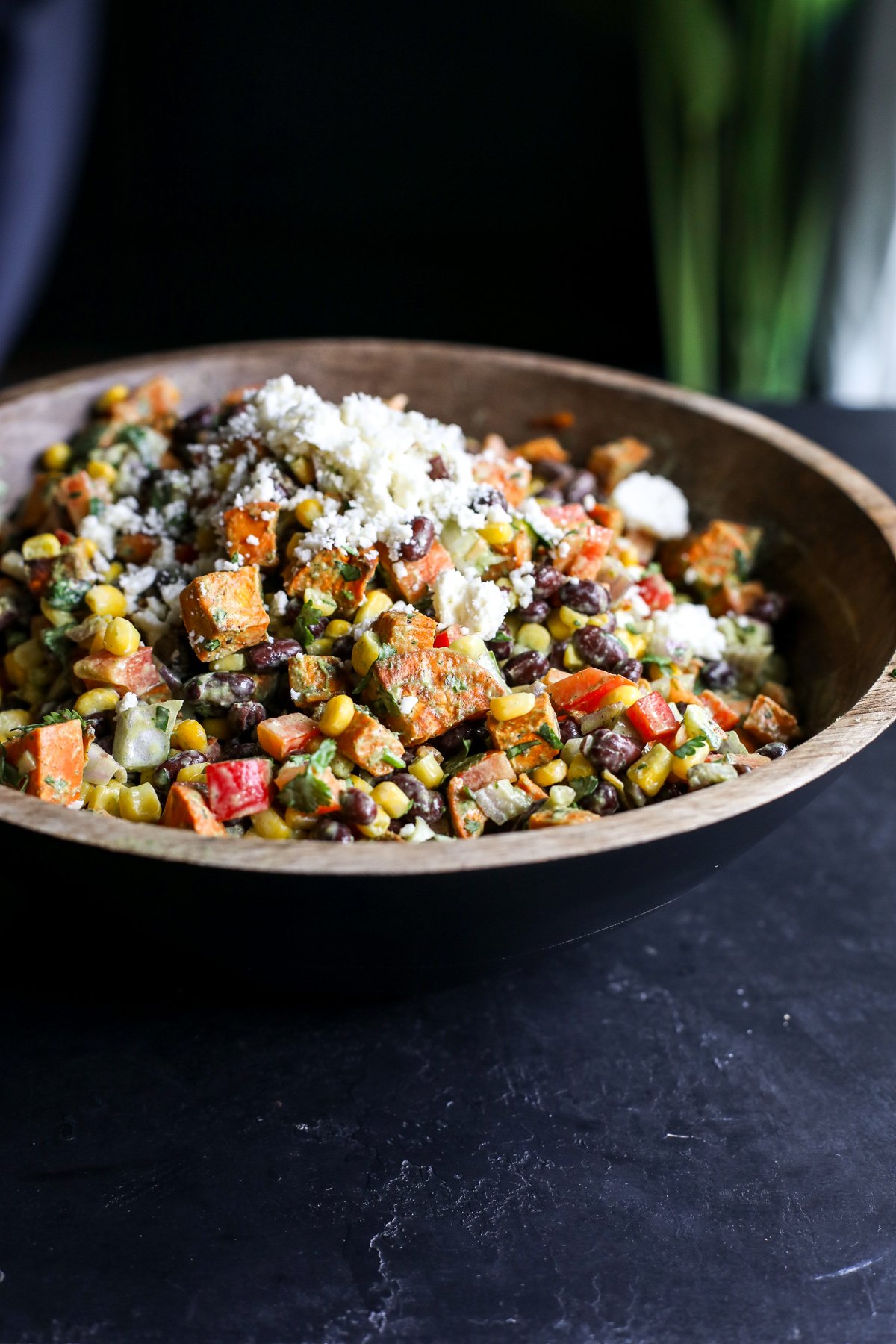Flavorful Sweet Potato, Black Bean & Corn Salad with a creamy cilantro dressing. Easy, healthy & perfect for a side or light meal!