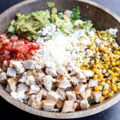 This recipe takes the classic Cobb salad and gives it a delicious Mexican twist! It's super easy to assemble, especially if you use pre-cooked ingredients.