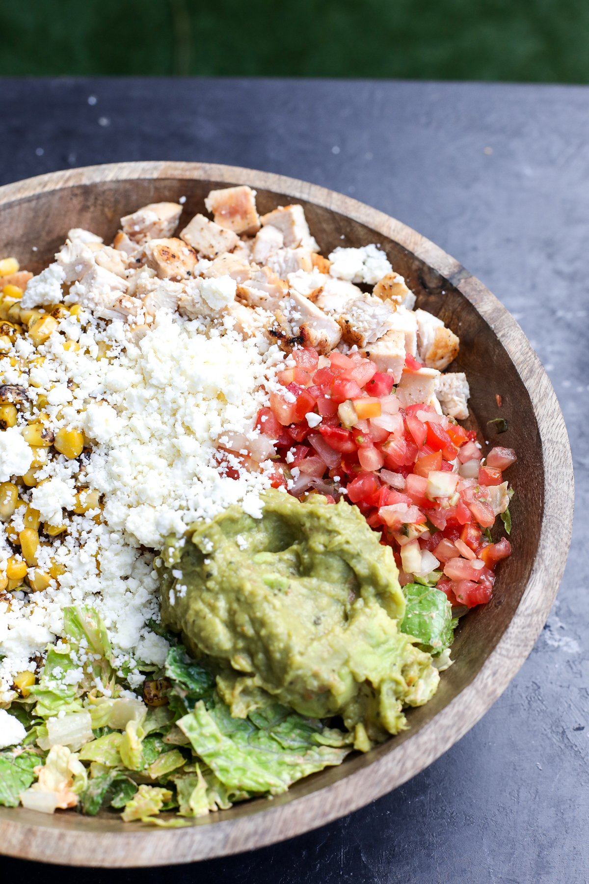 This recipe takes the classic Cobb salad and gives it a delicious Mexican twist! It's super easy to assemble, especially if you use pre-cooked ingredients.