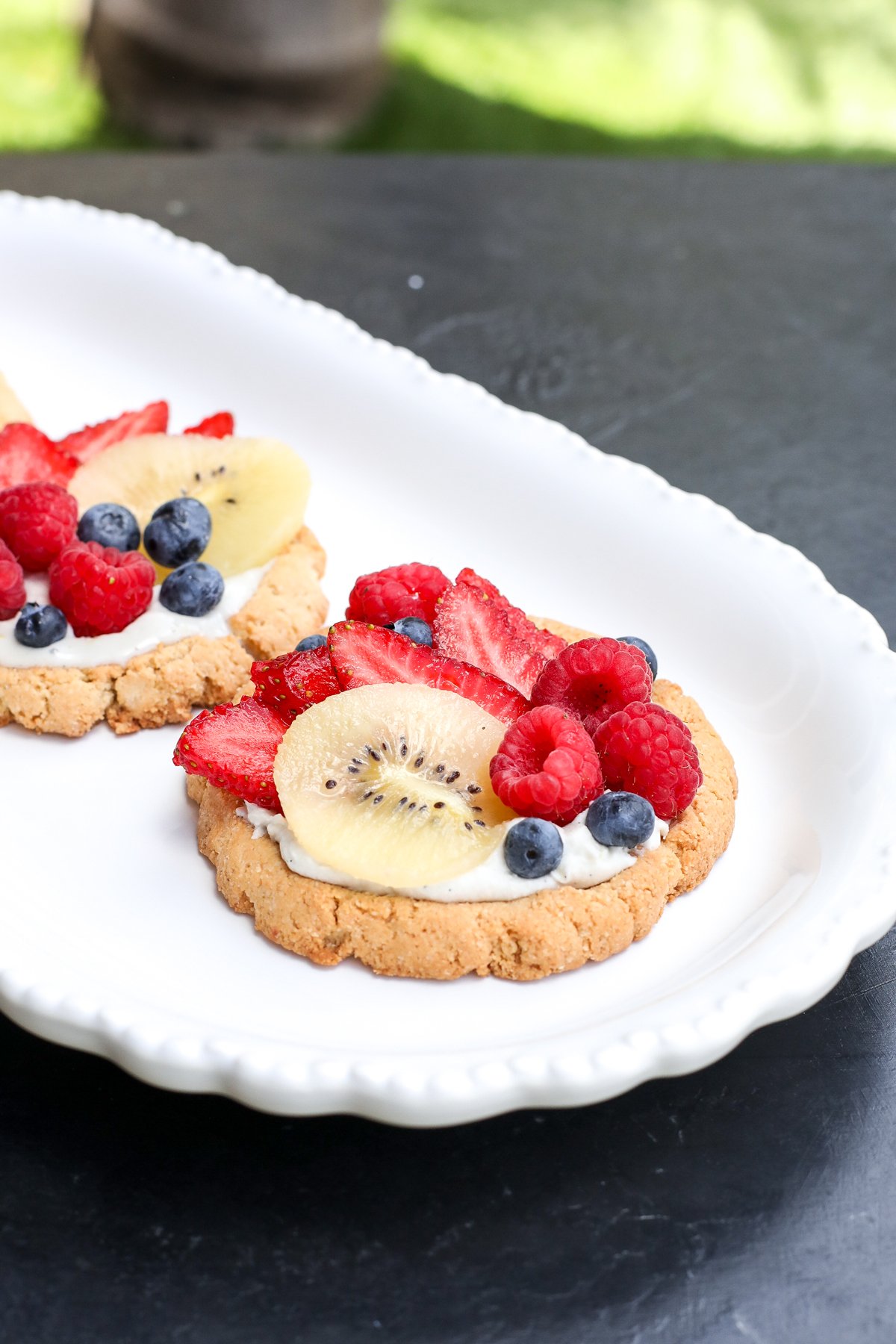 A simple, gluten-free Coconut Cream Fruit Tart with a crispy almond flour crust and a silky, dairy-free coconut cream filling.
