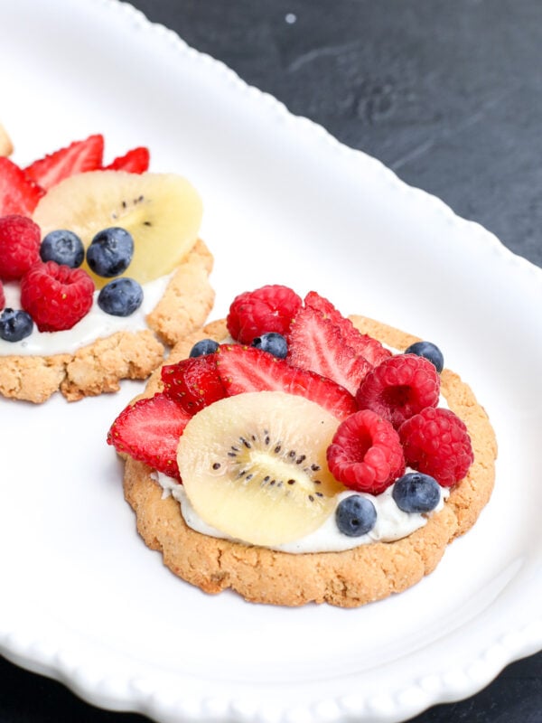 A simple, gluten-free Coconut Cream Fruit Tart with a crispy almond flour crust and a silky, dairy-free coconut cream filling.
