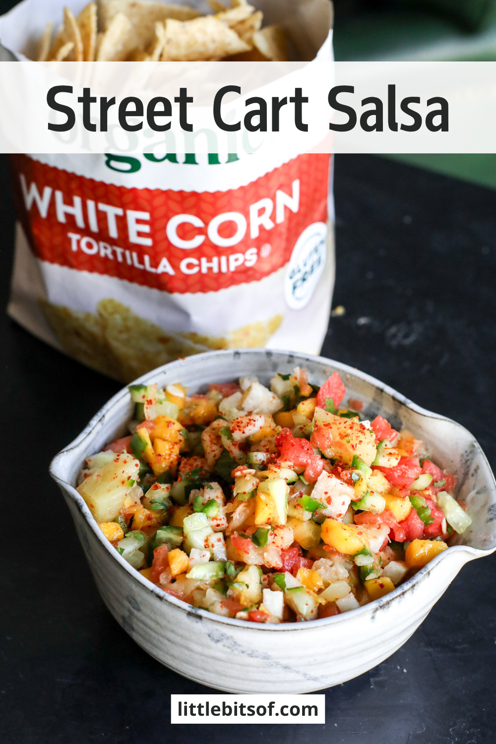 Dive into this vibrant street cart fruit salsa! Made with sweet mango, watermelon, and pineapple, plus a zesty kick from lime, Tajín, and jalapeño. The perfect summer snack or taco topping!