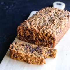 This simple recipe creates a wonderfully moist and tender loaf with all the cozy flavors of fall. The combination of quick oats and almond flour gives it a hearty texture, while the pumpkin and coconut sugar keep it soft and perfectly sweet.