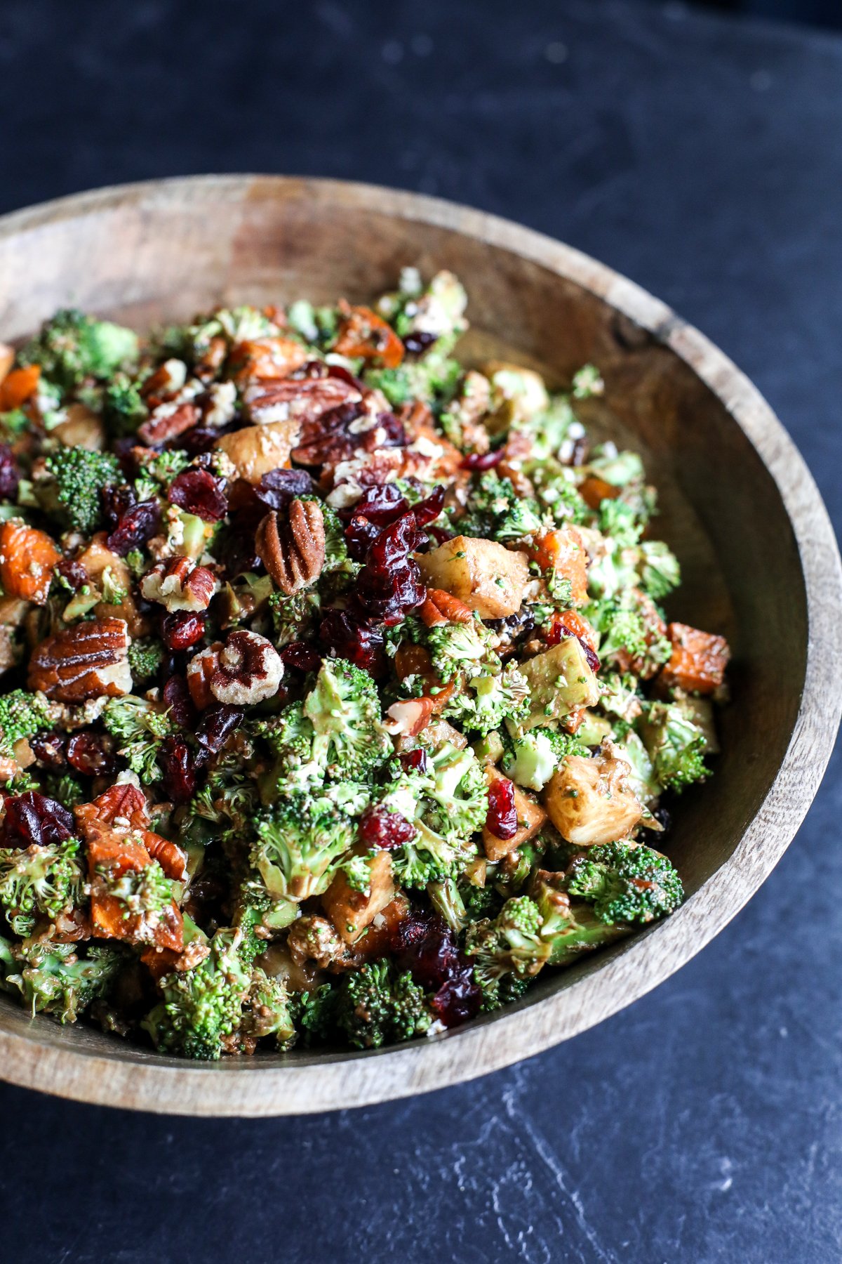 A perfect fall-inspired salad featuring roasted sweet potatoes, crunchy broccoli, and a tangy, creamy maple balsamic dressing.