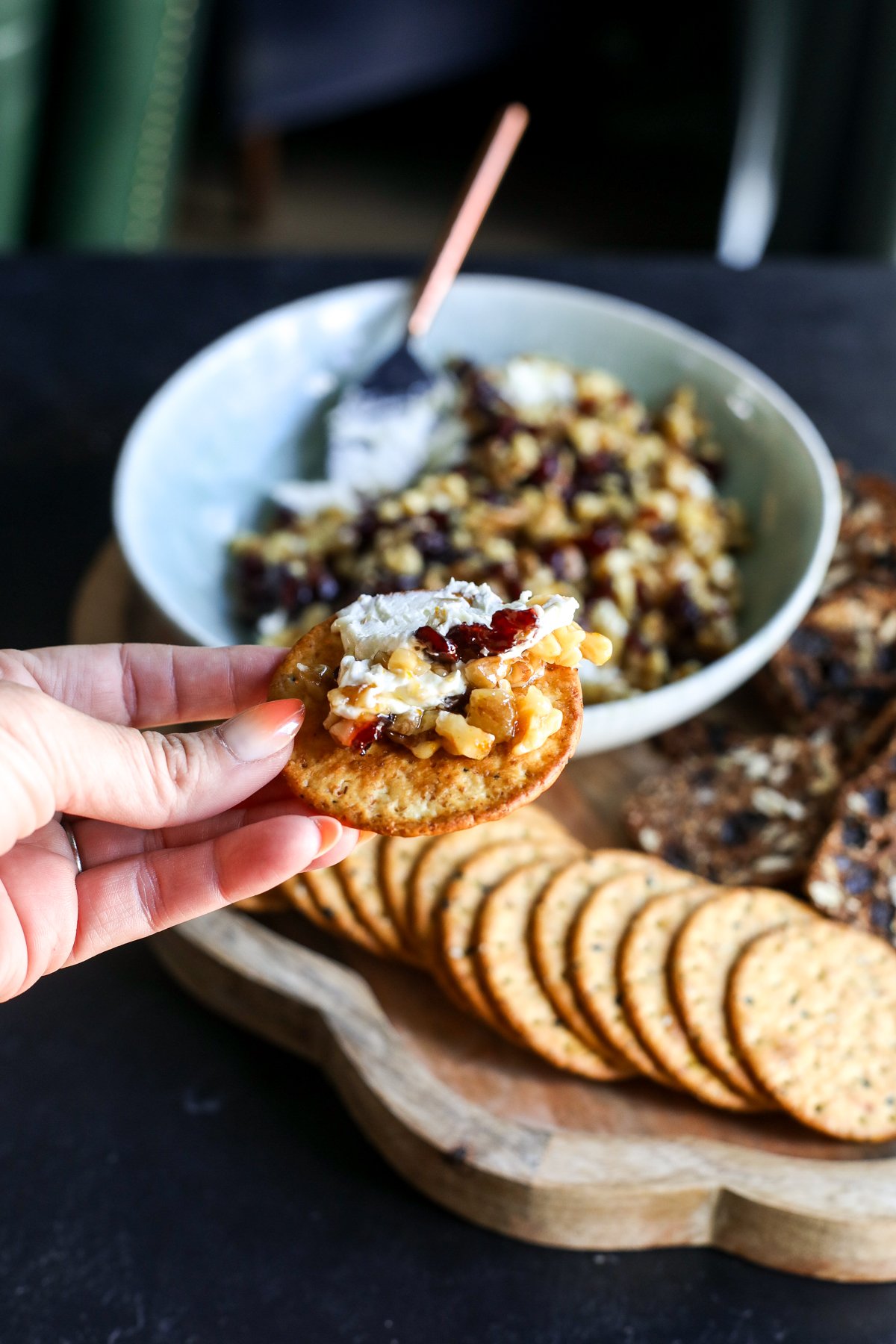 Indulge in this creamy, sweet & savory whipped goat cheese dip! Topped with a warm honey, cranberry, and walnut crunch.