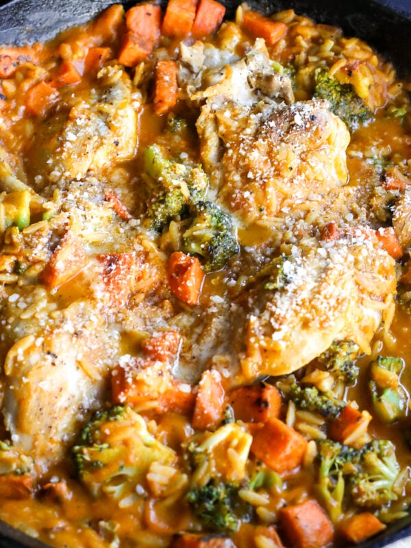 One-pan Harvest Orzo & Chicken Skillet! Flavorful boneless chicken, sweet potato, and broccoli simmered in autumn sauce with orzo.