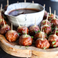 Holiday perfection: Cranberry, BBQ, and savory meatballs baked with a creamy slice of melted brie cheese.