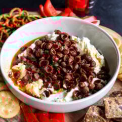 Sweet, spicy, and savory! Airy whipped goat cheese is paired with crunchy pepperoni and a fiery hot honey drizzle. The ultimate dip.