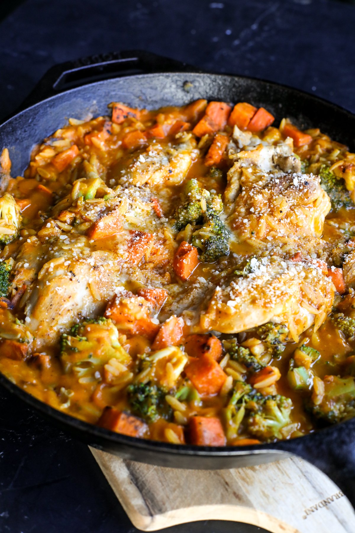 One-pan Harvest Orzo & Chicken Skillet! Flavorful boneless chicken, sweet potato, and broccoli simmered in autumn sauce with orzo.