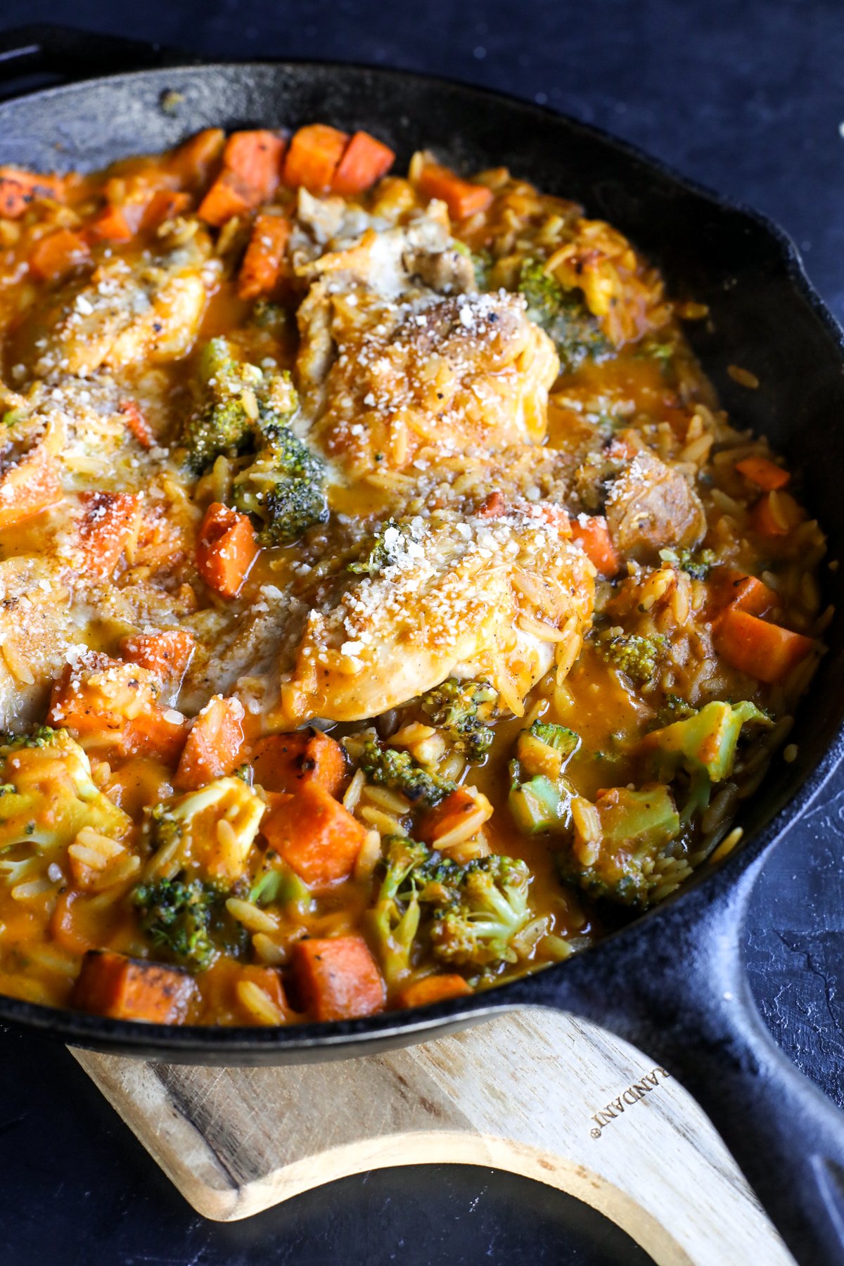 One-pan Harvest Orzo & Chicken Skillet! Flavorful boneless chicken, sweet potato, and broccoli simmered in autumn sauce with orzo.