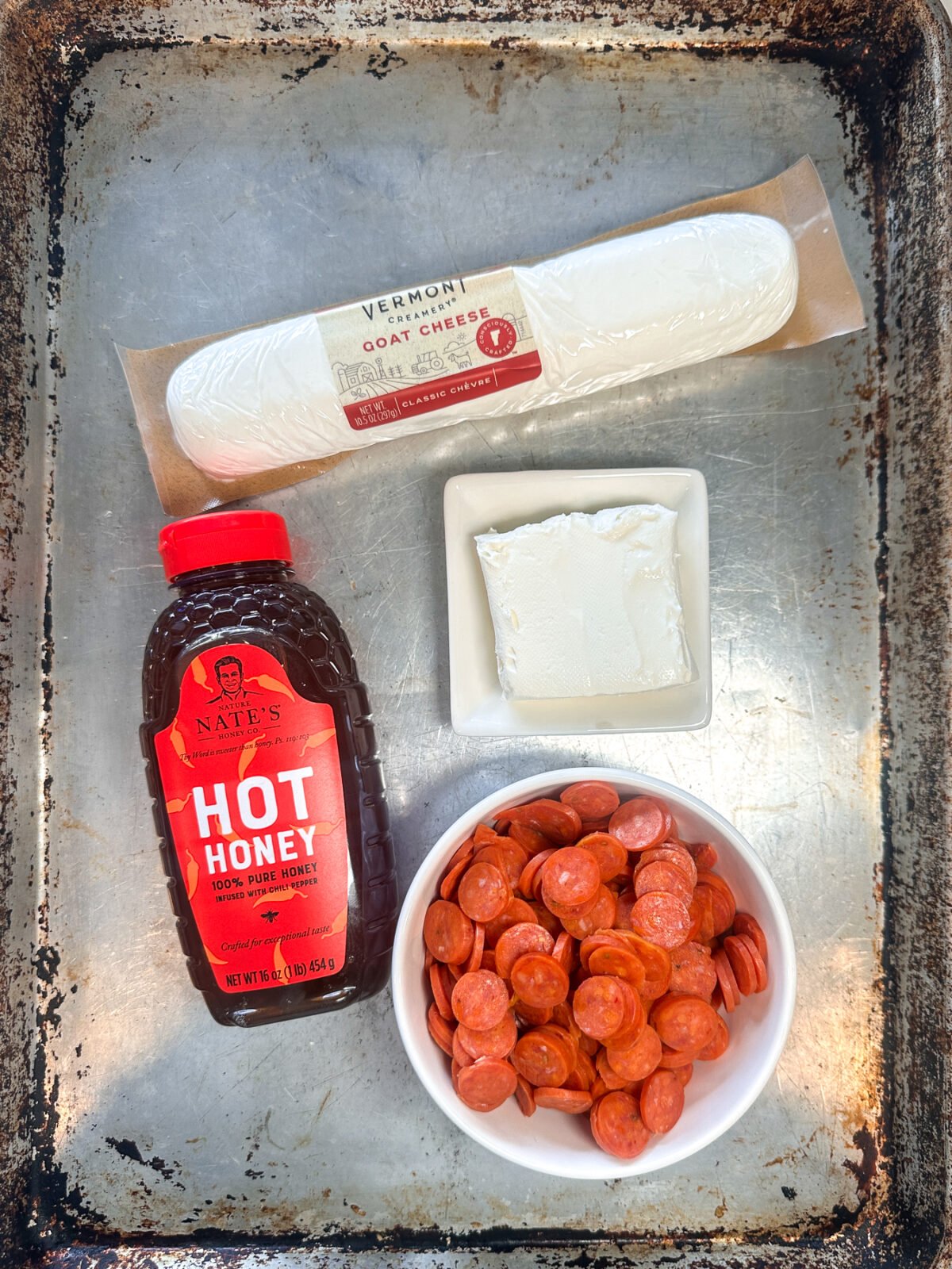 Sweet, spicy, and savory! Airy whipped goat cheese is paired with crunchy pepperoni and a fiery hot honey drizzle. The ultimate dip.