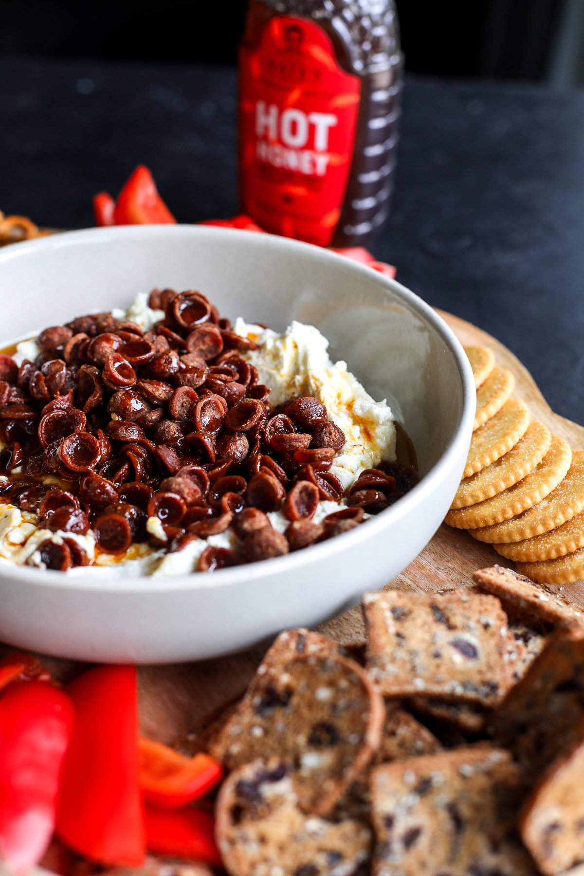 Sweet, spicy, and savory! Airy whipped goat cheese is paired with crunchy pepperoni and a fiery hot honey drizzle. The ultimate dip.
