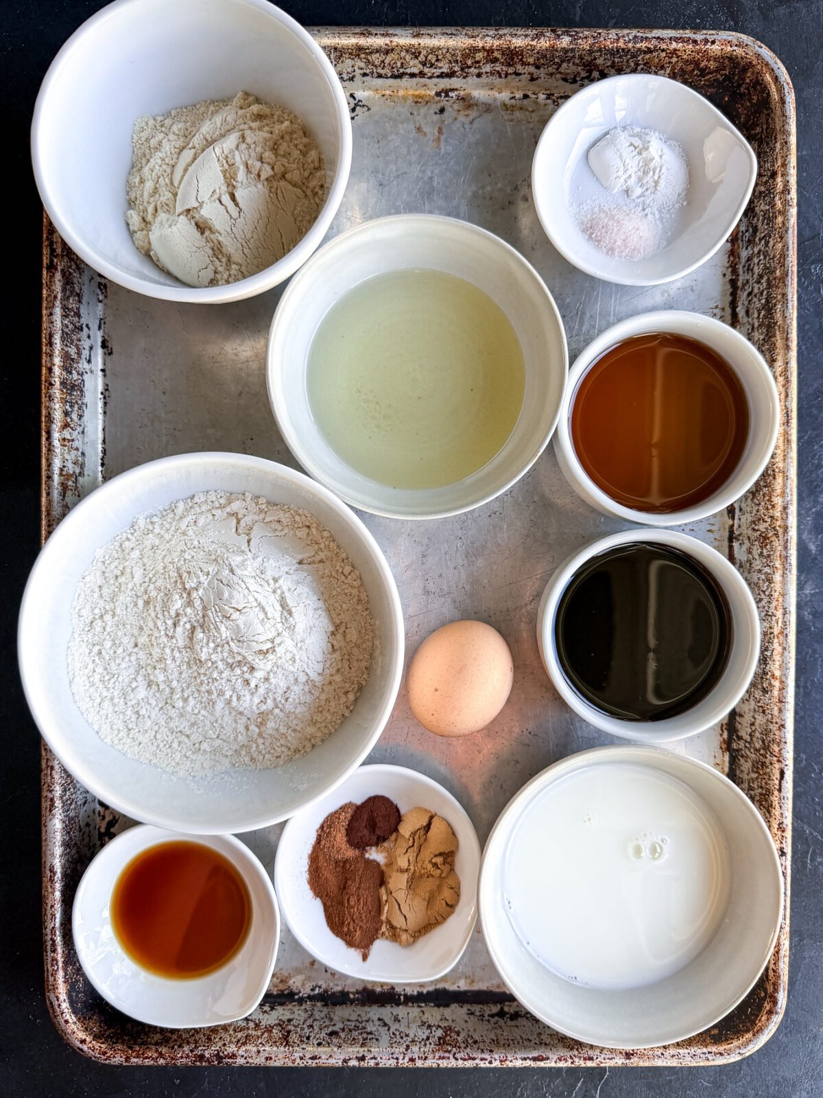 Healthy Gingerbread Protein Muffins! Warm, cozy spices and a protein boost make these the perfect holiday breakfast or snack.