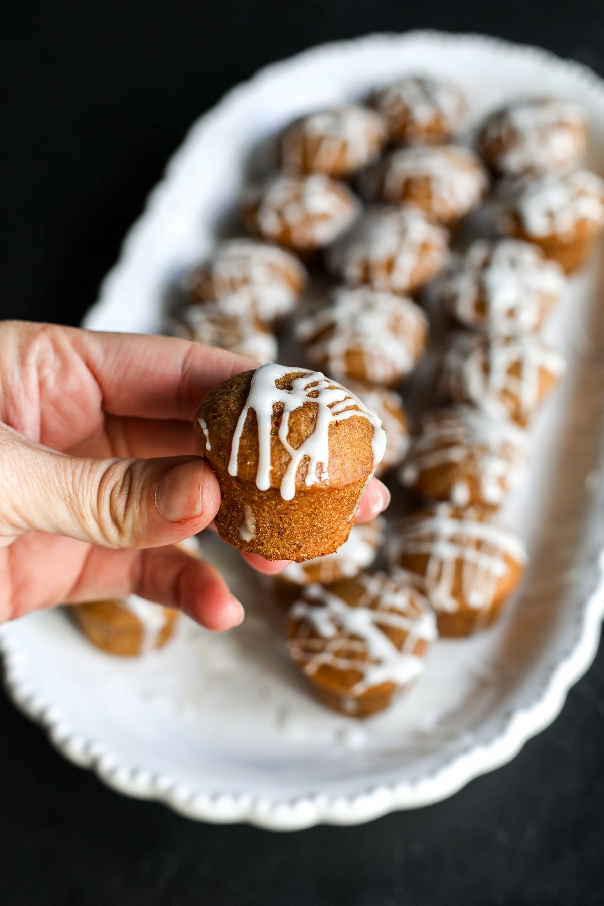 Healthy Gingerbread Protein Muffins! Warm, cozy spices and a protein boost make these the perfect holiday breakfast or snack.
