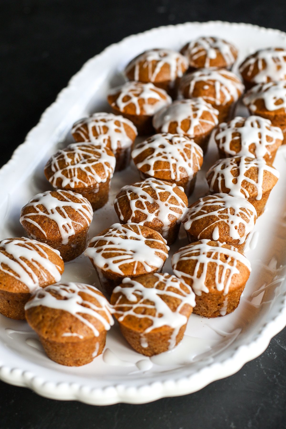 Healthy Gingerbread Protein Muffins! Warm, cozy spices and a protein boost make these the perfect holiday breakfast or snack.