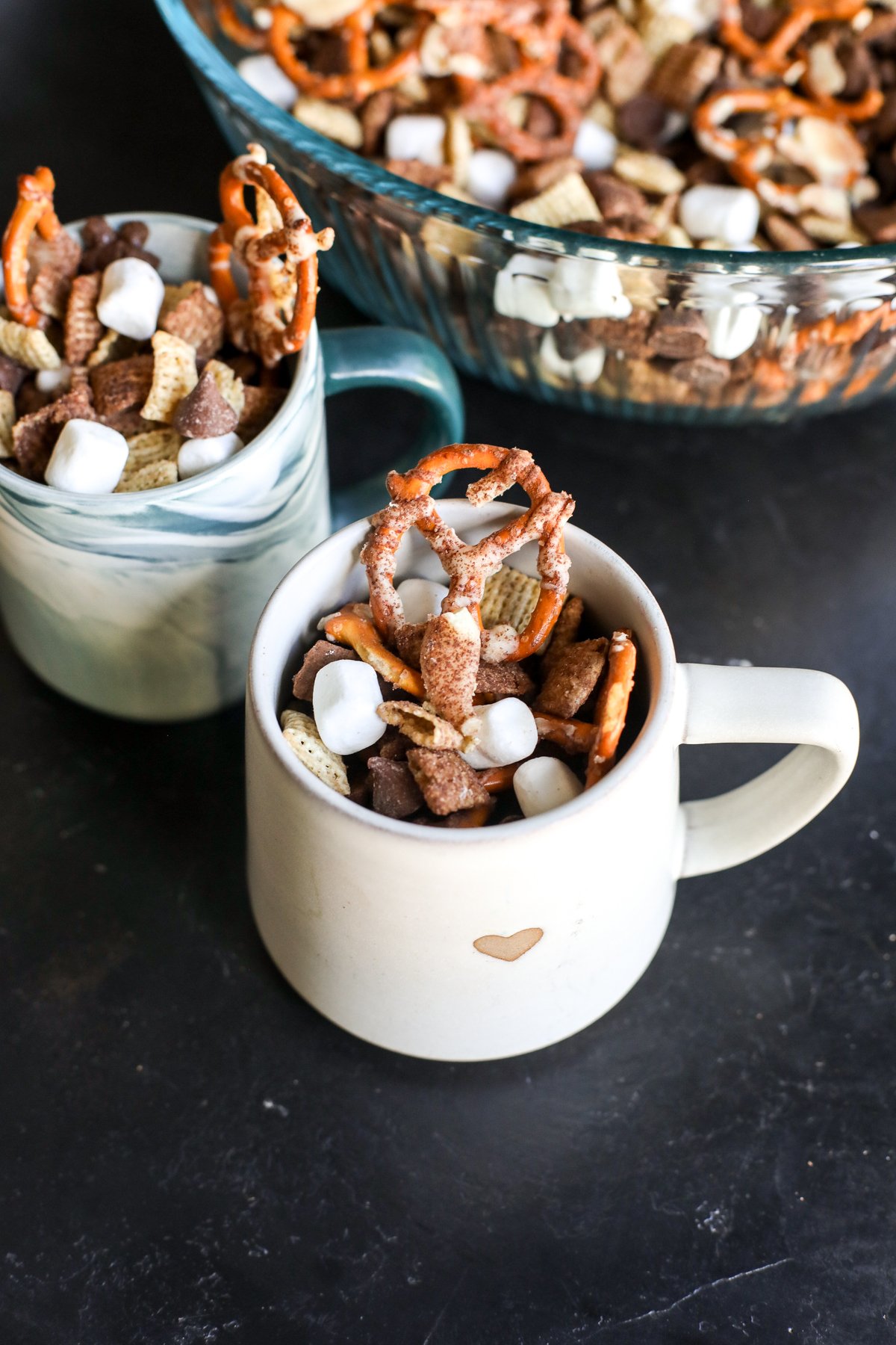 This easy, no-bake Chex mix brings the cozy flavor of hot cocoa to a crunchy, sweet snack! Perfect for parties.