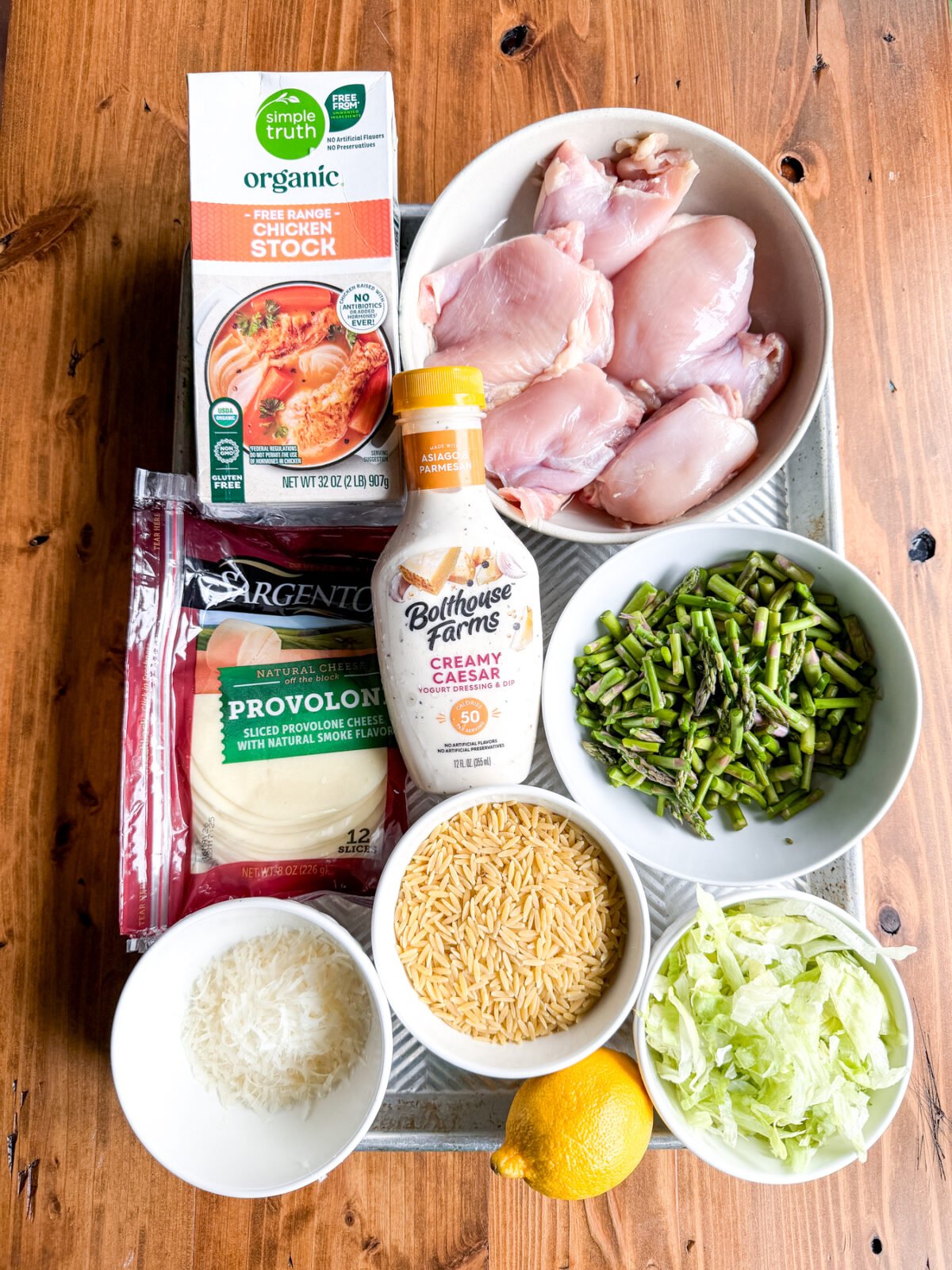 Turn Caesar salad into a cozy one-pan meal! Tender chicken, orzo, and asparagus in a creamy, savory dressing sauce.