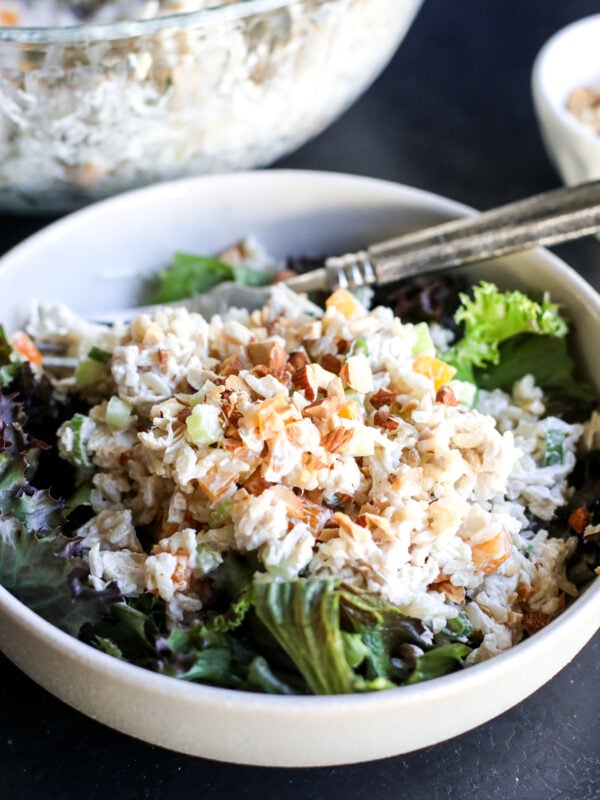 A refreshing Chicken and Rice Salad with crunchy almonds, fresh veggies, and a creamy, light yogurt dressing.