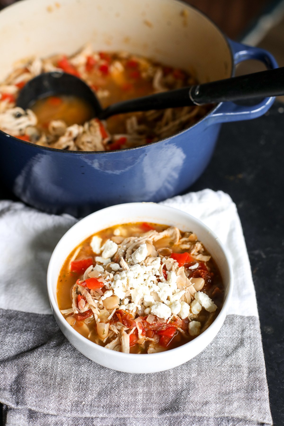 A fresh twist on chili! Creamy chicken and white beans with sun-dried tomatoes, feta, lemon, and Mediterranean herbs.