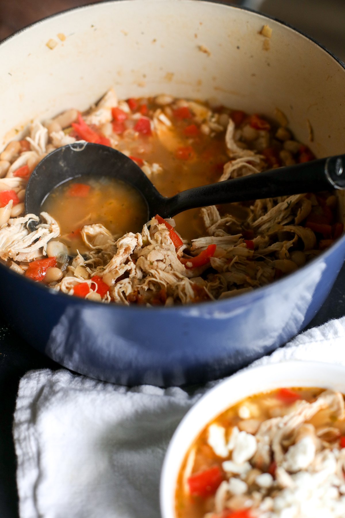 A fresh twist on chili! Creamy chicken and white beans with sun-dried tomatoes, feta, lemon, and Mediterranean herbs.